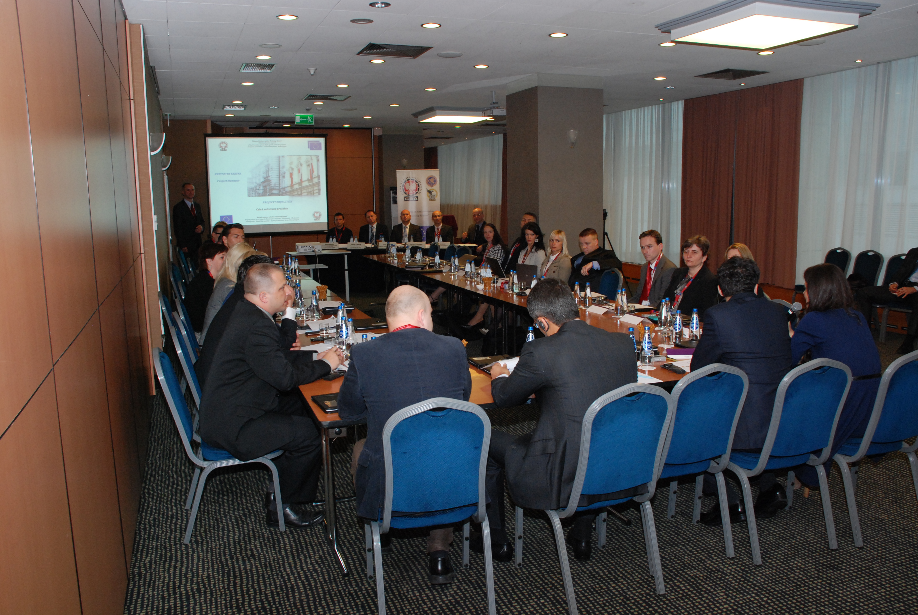 Participants at the Third Conference of the training sitting around the table