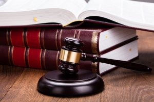 Judge&#039;s gavel, books in the background
