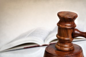 judge&#039;s gavel, book in the background