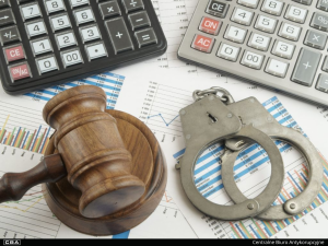 Handcuffs, invoices and two calculators