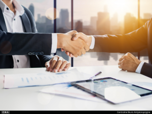 Two people shaking hands