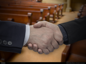 two people shaking hands